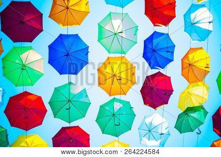 Colorful Umbrella Under Blue Sky, Colorful Umbrellas Art Installation In A City Centre, Many Colorfu