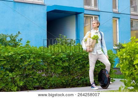 Modern Young Man Male Guy Successful Student Freelancer Entrepreneur With Package Of Food Vegatebles