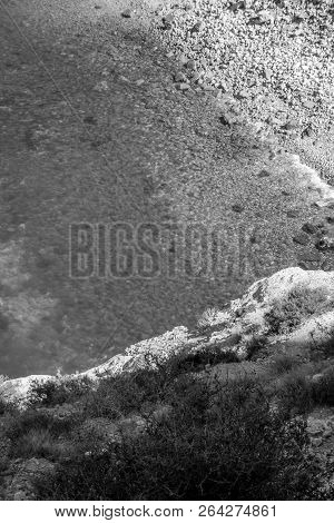 Jebha Island And Waves And Rocks