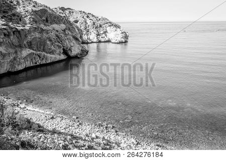 Jebha Island And Waves And Rocks