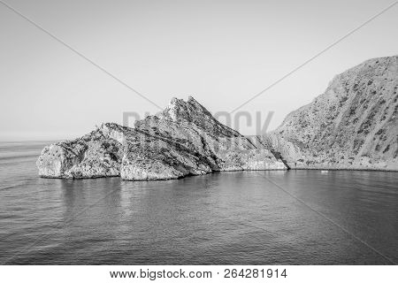 Jebha Island And Waves And Rocks
