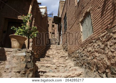 Mountain Village Abyaneh With Characteristic Red Houses In Central Part Of Iran. Unesco World Herita