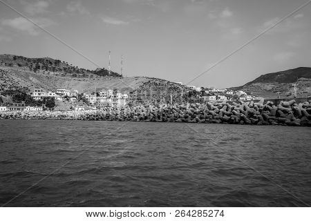 Jebha Island And Waves And Rocks