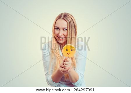 Bright Blond Woman Holding Stick With Emoji Lollipop Smiling At Camera