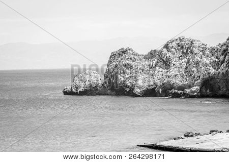 Houcima Beach And Waves And Rocks