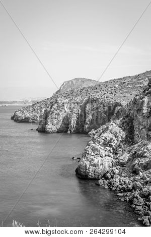 Houcima Beach And Waves And Rocks