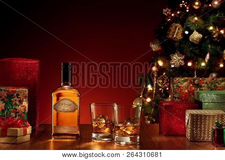 No Logo Or Trademark! Self Made Labels!  Close Up View  Of Two Glasses With Whiskey On Color Back.