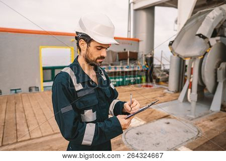 Marine Deck Officer Or Chief Mate On Deck Of Vessel Or Ship