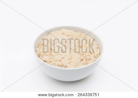 Oatmeal In White Plate On White Background. Isolated On White