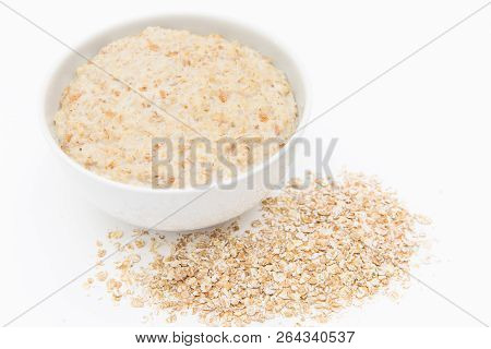 Oatmeal In White Bowl On White Background. Isolated On White. Healthy Food