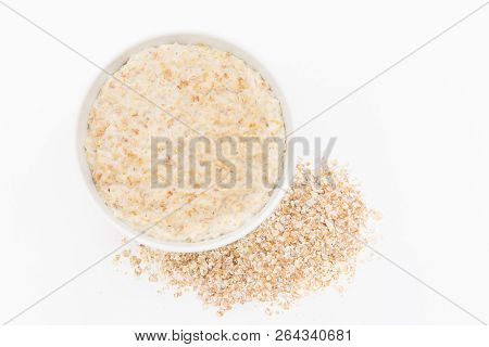 Oatmeal In White Bowl On White Background. Isolated On White. Healthy Food