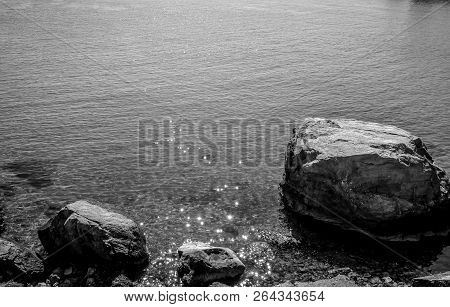 Houcima Beach In Summer With Waves And Rocks