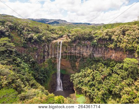Aerial Top View Perspective Of Chamarel Waterfall In The Tropical Island Jungle Of Mauritius.