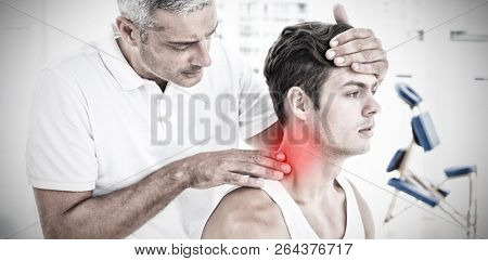 Highlighted pain against physical therapist examining patient head