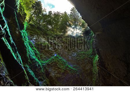 Entrance In Scarisoara Cave, Apuseni Mountains, Romania