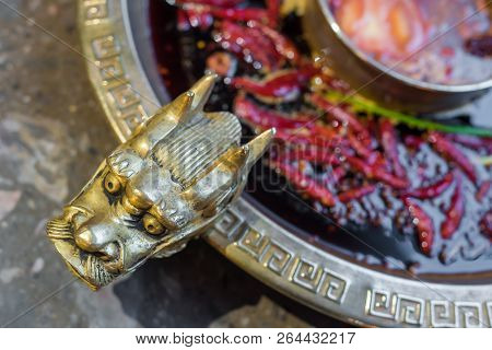 Chengdu Sichuan Hot Pot Close Up With Dragon Head Sculpted Handles, Chenggdu, Sichuan Province, Chin