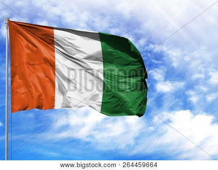 National Flag Of Cote D, Lvoire On A Flagpole
