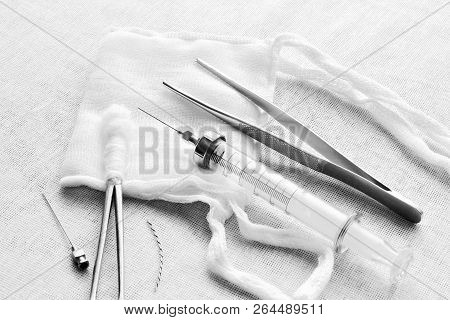 Glass Syringe With Steel Needle, Forceps With Cotton Swab, Steel Tweezers, Medical Mask Made Of Gauz