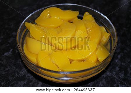 Glass Bowl With Yellow, Ripe, Tasty Peach