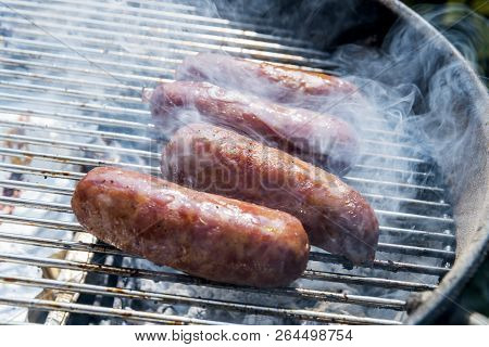 Sausages Cook On The Grill