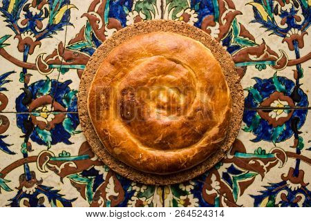 Turkish Bread Kete On A Ottoman Pattern Surface.