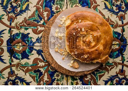 Turkish Bread Kete On A Ottoman Pattern Surface.