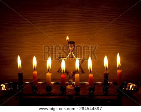 Hanukkah Is A Jewish Holiday. Burning Chanukah Candlestick With Candles. Chanukiah Menorah.