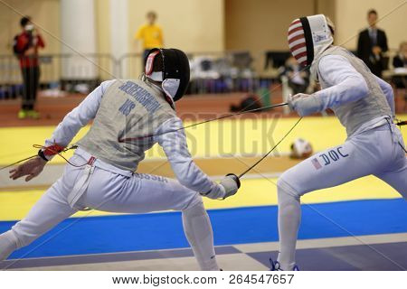 ST. PETERSBURG, RUSSIA - MAY 6, 2018: Team competition Russia vs USA during Fencing World Cup Saint-Petersburg Foil. This annual tournament is hold in 44th time