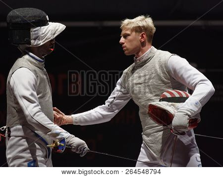 ST. PETERSBURG, RUSSIA - MAY 6, 2018: Race Imboden, USA (right) in the team final match against Italy during Fencing World Cup Saint-Petersburg Foil. This annual tournament is hold in 44th time