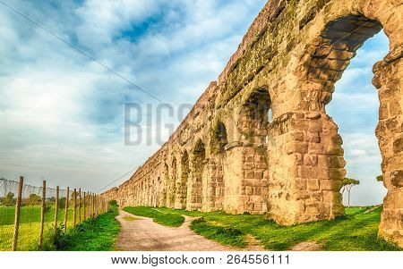 Ruins Of The Iconic Parco Degli Acquedotti, Rome, Italy. The Public Park Is Named After The 7 Ancien