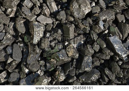 Coal Anthracite Enriched With A Large Grade, As A Background.