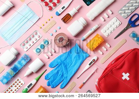 Flat Lay Composition With First Aid Kit On Color Background