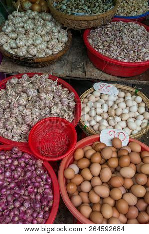 Farmers Market Stall Selling Fresh Eggs And Garlic. Farmers Market Produce Background
