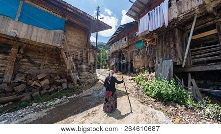 Artvin, Turkey - July 2018: Unidentified Woman In Local Outfit Walking In Maden Village , Savsat, Ar