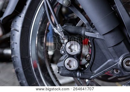 Cropped Close Up Shot Of Beautiful And Custom Made Motorcycle In The Workshop