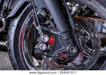 Cropped Close Up Shot Of Beautiful And Custom Made Motorcycle In The Workshop