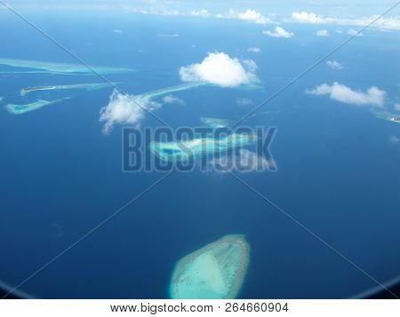 Maledives From Plane In The Water And Island