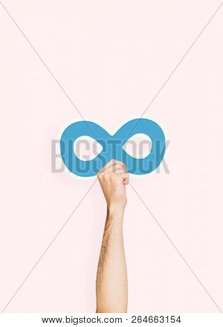 Hand holding an infinity sign