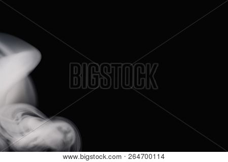 Cigarette Smoke On Black Background Detailed Close-up