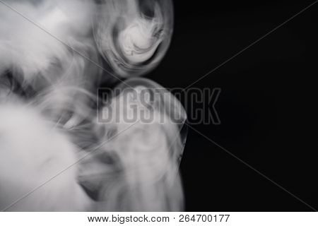 Cigarette Smoke On Black Background Detailed Close-up