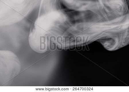 Cigarette Smoke On Black Background Detailed Close-up
