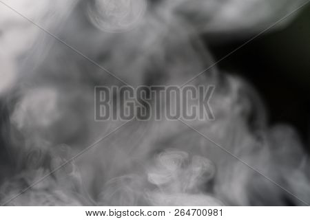 Cigarette Smoke On Black Background Detailed Close-up