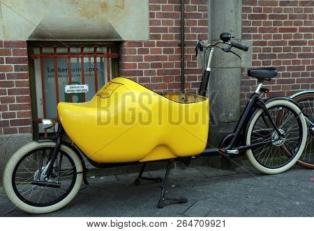 Big Wooden Shoe On A Transport Bicycle