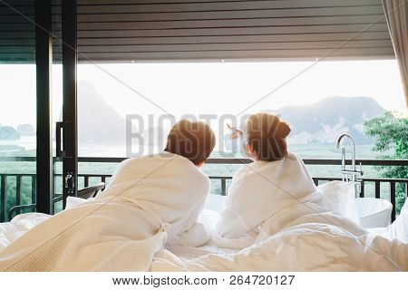 Couple Man And Woman On Bed Relaxing Mountains And Sunrise Aeria