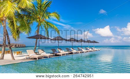 Inspirational Relaxation Beach Chair With Umbrella On Private Pool, Ocean View. Luxury Swimming Pool