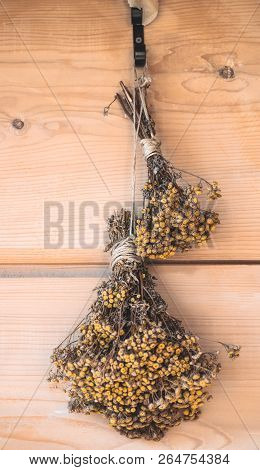 Bouquet Of Dried Flowers On A Vintage Cafe Background. Vintage Decoation For Cafe And Restaurant.