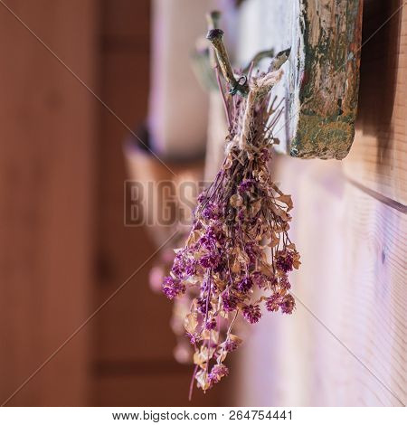 Bouquet Of Dried Flowers On A Vintage Cafe Background. Vintage Decoation For Cafe And Restaurant.
