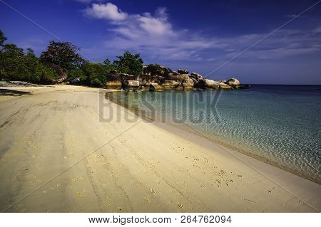 View Of A Group Of Big Stones On The Tanjung Tinggi Beach From Island Belitung/indonesia/