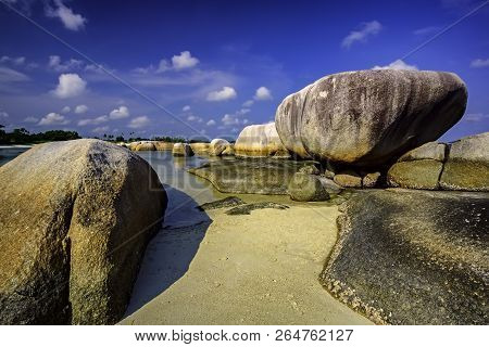 View Of A Group Of Big Stones On The Tanjung Tinggi Beach From Island Belitung/indonesia/