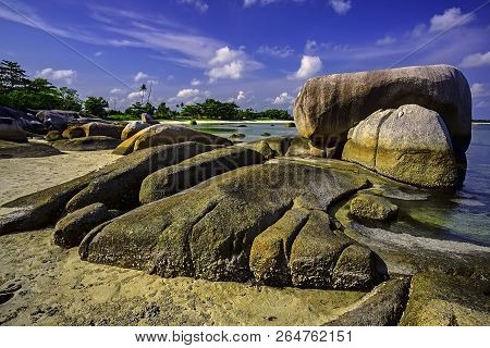 View Of A Group Of Big Stones On The Tanjung Tinggi Beach From Island Belitung/indonesia/